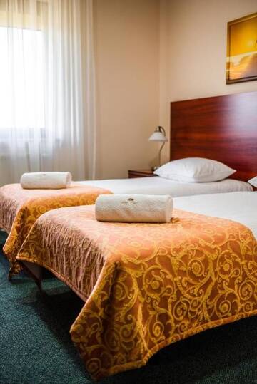 Фото номера Двухместный номер с 2 отдельными кроватями Отель Hotel Polonia г. Бяла-Подляска 3
