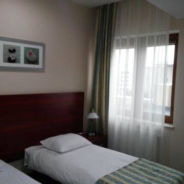 Фото номера Двухместный номер с 2 отдельными кроватями Отель Hotel Polonia г. Бяла-Подляска 9