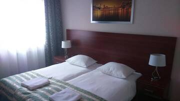 Фото номера Двухместный номер с 2 отдельными кроватями Отель Hotel Polonia г. Бяла-Подляска 10
