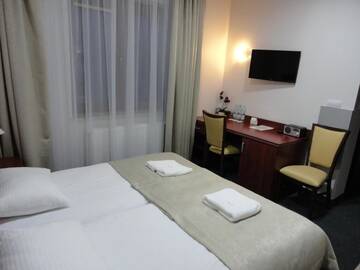 Фото номера Двухместный номер эконом-класса с 1 кроватью Отель Hotel Polonia г. Бяла-Подляска 2