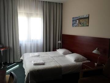 Фото номера Двухместный номер эконом-класса с 1 кроватью Отель Hotel Polonia г. Бяла-Подляска 3
